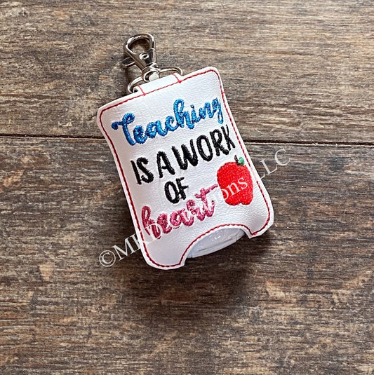 Teaching is a work of heart Key chain hand sanitizer holder w/o 1 oz. hand sanitizer | key chain hand sanitizer not included