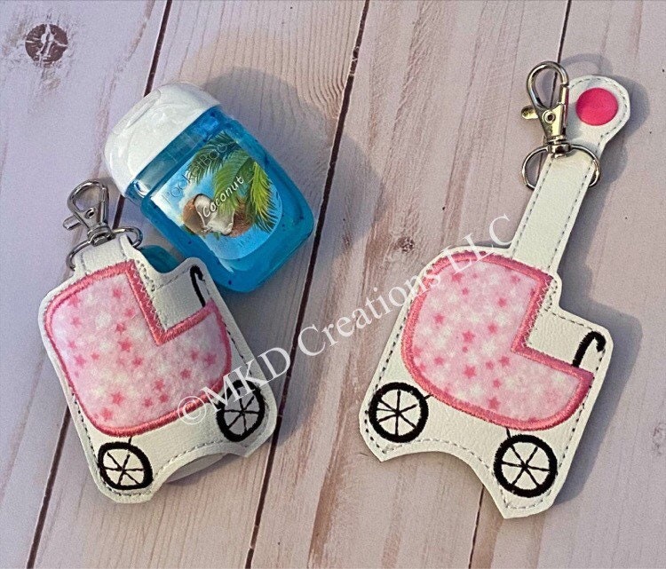 Baby carriage appliqué with pink stitching on vinyl Key chain hand sanitizer holder | keychain hand sanitizer not included