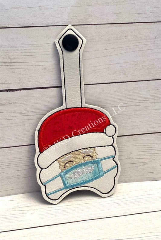 Santa with a mask and a red hat key chain hand sanitizer holder w/o 1 oz. hand sanitizer | key chain hand sanitizer not included |
